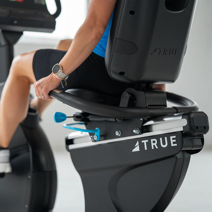 True Fitness Apex Recumbent Bike in use