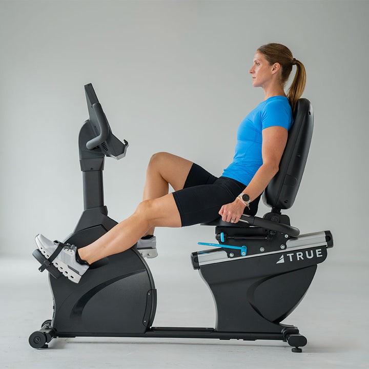 True Fitness Apex Recumbent Bike in use