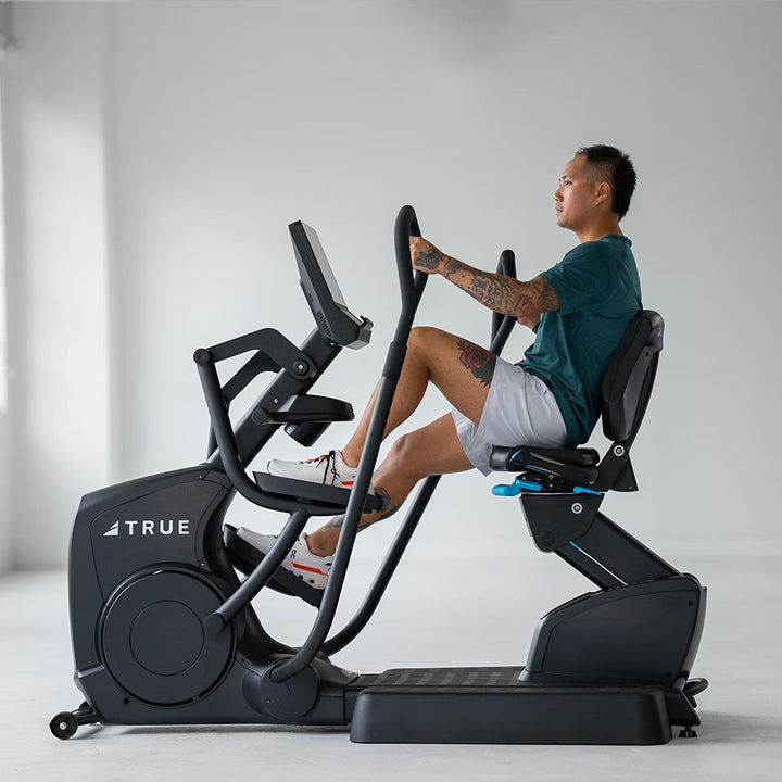 True Fitness Apex Recumbent Elliptical in use