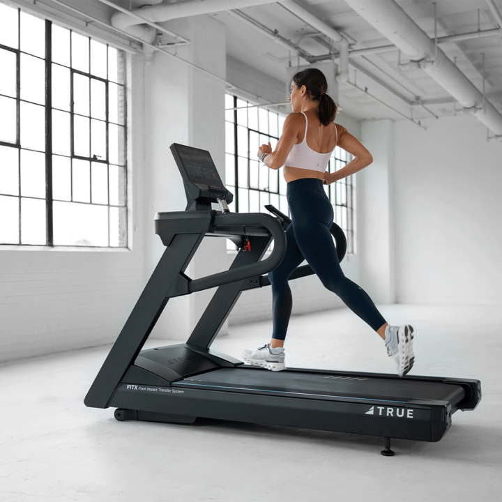 True Fitness Apex Treadmill in use