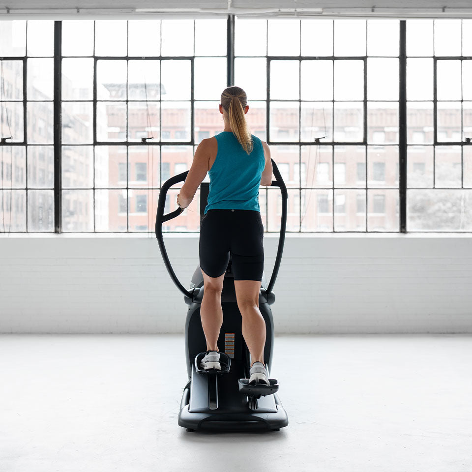 True Fitness Gravity Cross Trainer in use