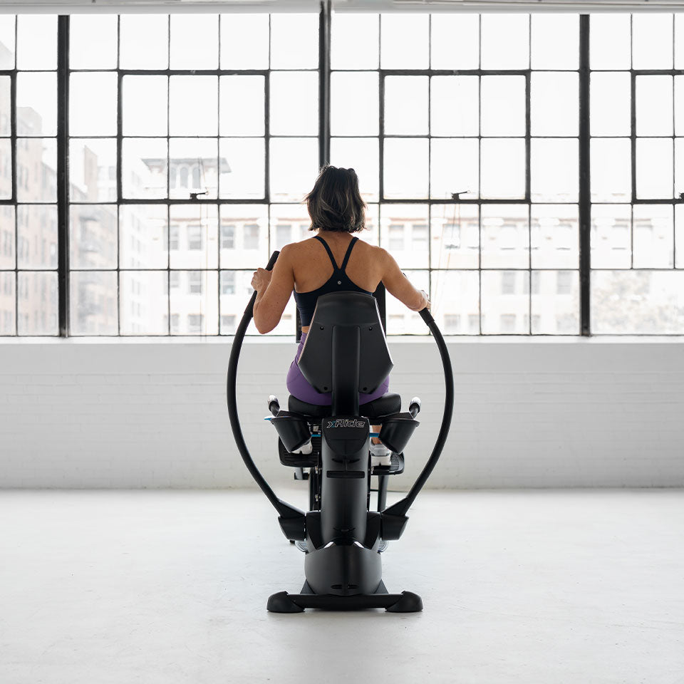 True Fitness Gravity Recumbent Elliptical in use