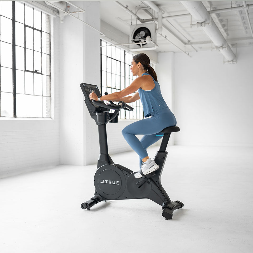 True Fitness Gravity Upright Bike in use