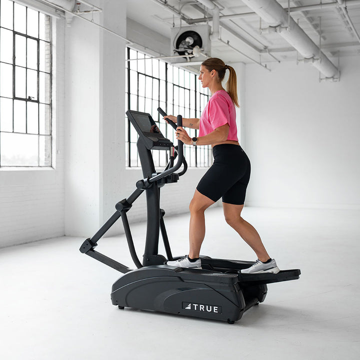 True Fitness Launch Elliptical in use