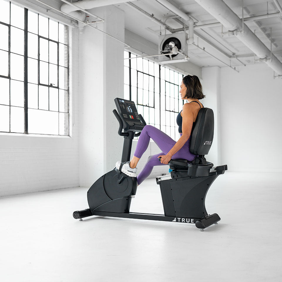 True Fitness Launch Recumbent Bike in use