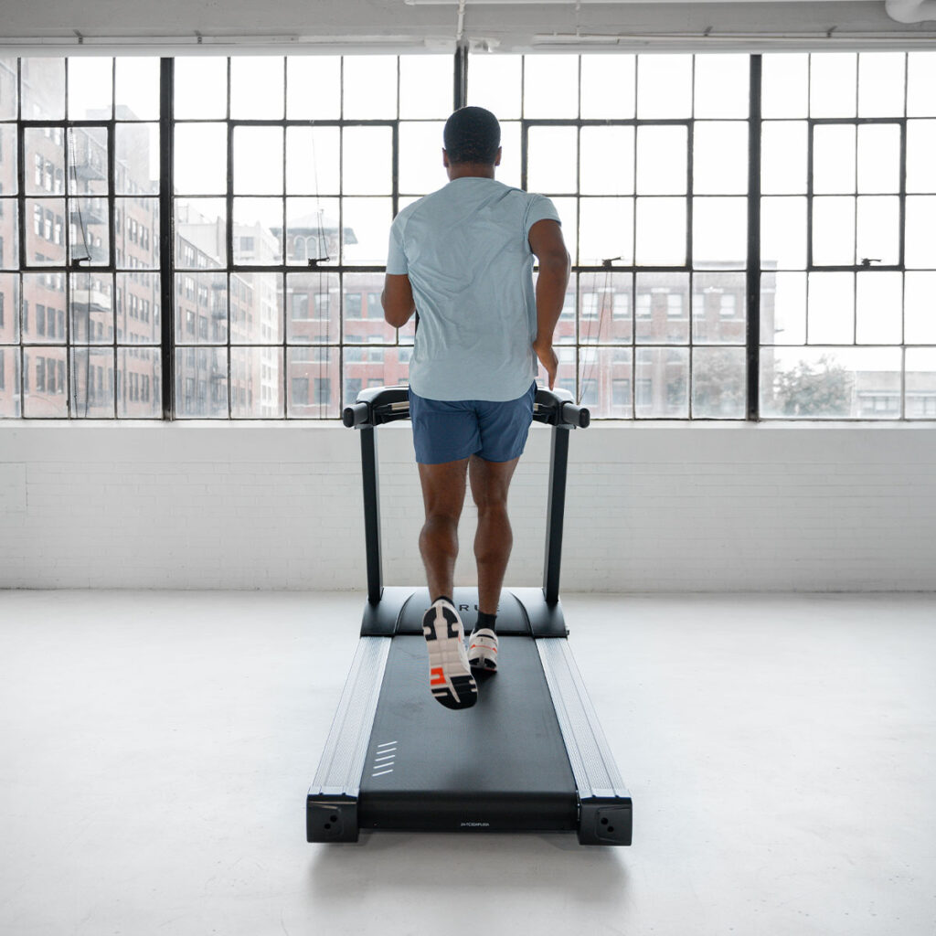 True Fitness Launch Treadmill in use