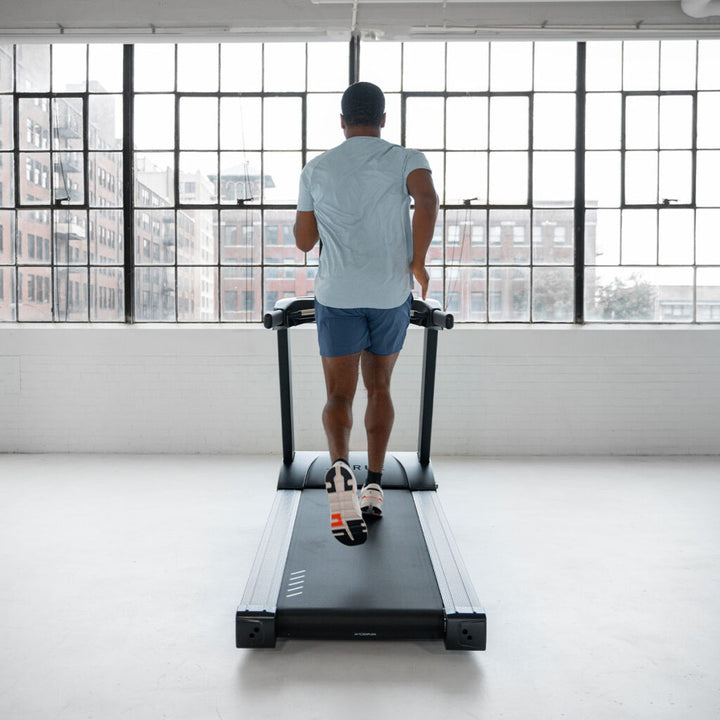 True Fitness Launch Treadmill in use