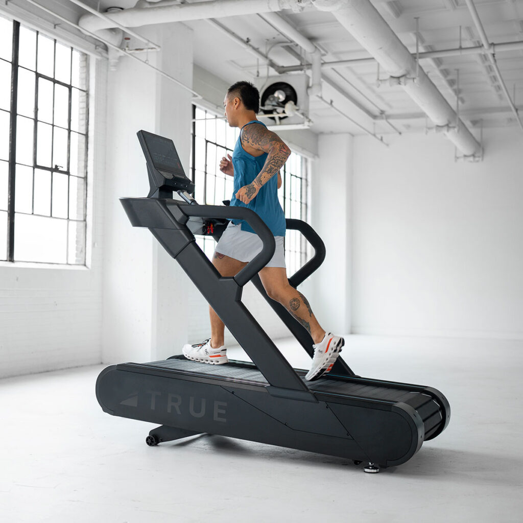 True Fitness Stryker Slat Treadmill in use